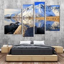 Load image into Gallery viewer, Norway Archipelago Canvas Print Blue Sky Lofoten Island Wall Art White Snowy Mountain River 4 Piece Multi Canvas In Bedroom

