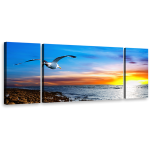 Bird Sunset Wall Art, Dramatic Clouds in Orange Sky Canvas Print, Blue Sky Bird Soaring Triptych Canvas Set