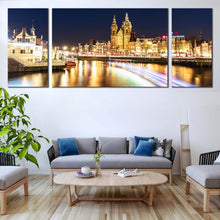 Load image into Gallery viewer, Harbors  City  Canvas  Wall  Art  Blue  Sky  Amsterdam  Centraal  Damrak  Canvas  Artwork  Yellow  City  Lights  Reflection  Canal    3  Piece  Canvas  Print For Living Room
