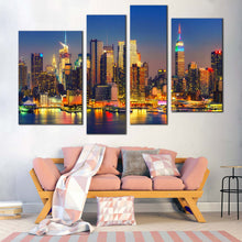 Load image into Gallery viewer, Manhattan Cityscape Canvas Wall Art Blue Sky New York City 4 Piece Multiple Canvas Yellow Midtown Manhattan Lights Reflection Canvas Print
