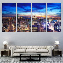 Load image into Gallery viewer, Manhattan Cityscape Canvas Wall Art Dramatic Blue Sky Multi Canvas NYC Skyline Aerial View Canvas Print Yellow New York City Lights In Living Room
