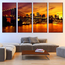 Load image into Gallery viewer, Manhattan Sunset Canvas Wall Art Dramatic Orange Yellow Sky Cityscape Multi Canvas New York Brooklyn Bridge  4 Piece Canvas In Living Room
