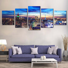 Load image into Gallery viewer, Midtown Manhattan Canvas Wall Art Yellow New York City Lights Canvas Set Blue Sky Cityscape Canvas Print NYC Skyline Aerial View In Living Room
