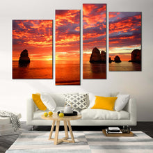 Load image into Gallery viewer, Ocean Boulders Canvas Wall Art Dramatic Orange Cloudy Sky Seascape  4 Piece Canvas Print Yellow Sunset Ocean Rocks Split Canvas 
