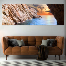 Load image into Gallery viewer, Ocean  Rocks  Canvas  Print  Inside  Brown  Cave  Ocean  Living  Room  1  Piece  Canvas  Wall  Art  Yellow  Cloudy  Sunset  Sky  Canvas In Living Room
