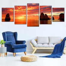 Load image into Gallery viewer, Ocean Rocks Canvas Wall Art Yellow Cliffs Ocean Sunset 5 Piece Multi Panel Canvas Dramatic Orange Clouds Sky Canvas Print In Living Room
