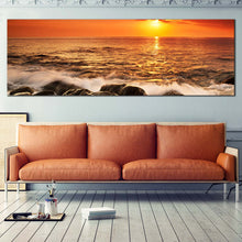 Load image into Gallery viewer, Ocean  Rocks  Canvas  Wall  Art  Yellow  Sunset  at  Sea  Wide  Canvas  Orange  Sky  Seascape  Waves  Living  Room  Panoramic  Canvas  Print In Living Room
