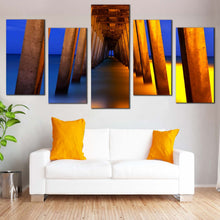 Load image into Gallery viewer, Pier Ocean Canvas Wall Art Under Pier Blue Yellow Sea Multi Canvas Orange Pier Pillars  5 Piece Canvas Print
