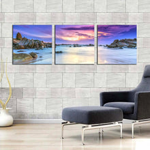 Load image into Gallery viewer, Rocky Beach Canvas Wall Art Dramatic Blue Sky Sea Canvas Set Brown Dawn Beach Scenery 3 Piece Canvas Print For Living Room
