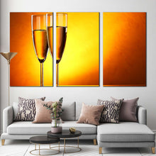 Load image into Gallery viewer, alcohol glasses canvas wall art yellow orange champagne glasses 3 piece multi canvas romantic champagne glasses triptych canvas print In Living Room
