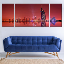 Load image into Gallery viewer, dubai  blue  light  city  reflection  canvas  wall  arf  united  arab  emirates  red  skyline  3  piece  canvas  print In Living Room
