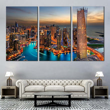 Load image into Gallery viewer, marina city dreams canvas cloudy yellow sunset sky multi canvas orange dubai city skyline 3 piece wall art In Living Room

