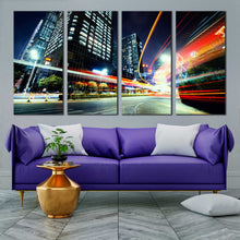 Load image into Gallery viewer, modern busy city traffic lights trail at dark 4 piece canvas print In Living room

