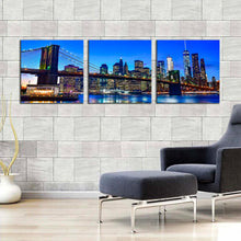 Load image into Gallery viewer, new  york  canvas  wall  art  blue  sky  manhattan  cityscape  3  piece  canvas  set  black  brooklyn  bridge  triptych  canvas  print In Living Room
