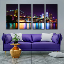Load image into Gallery viewer, nyc cityscape canvas wall art manhattan purple sky brooklyn bridge canvas print colorful new york skyline 4 piece canvas set In Living Room
