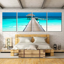 Load image into Gallery viewer, pier in maldives beach bungalows 4 panel canvas prints In Bedroom
