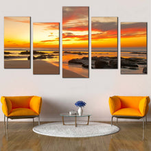 Load image into Gallery viewer, yellow sea with blulders at sunset 5 Piece photography prints in living room
